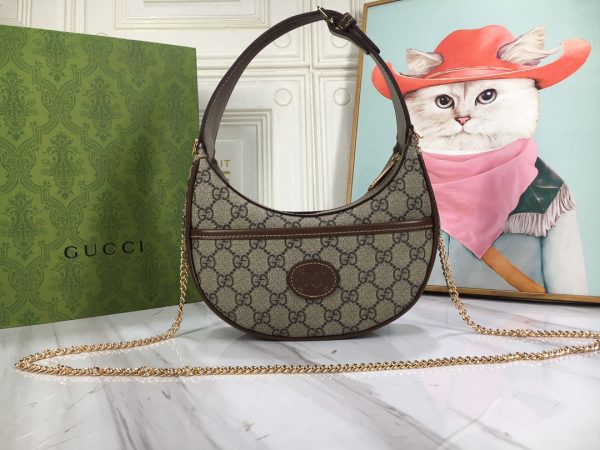 Half-moon-shaped mini bag with Interlocking G