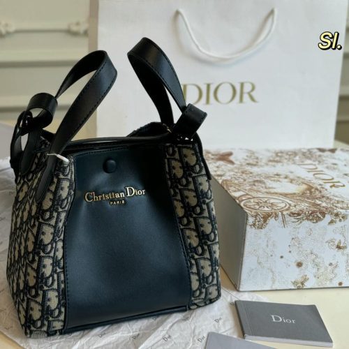 Small Signature Bucket Bag (1)