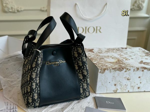 Small Signature Bucket Bag (1)