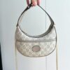 Half-moon-shaped mini bag (24)